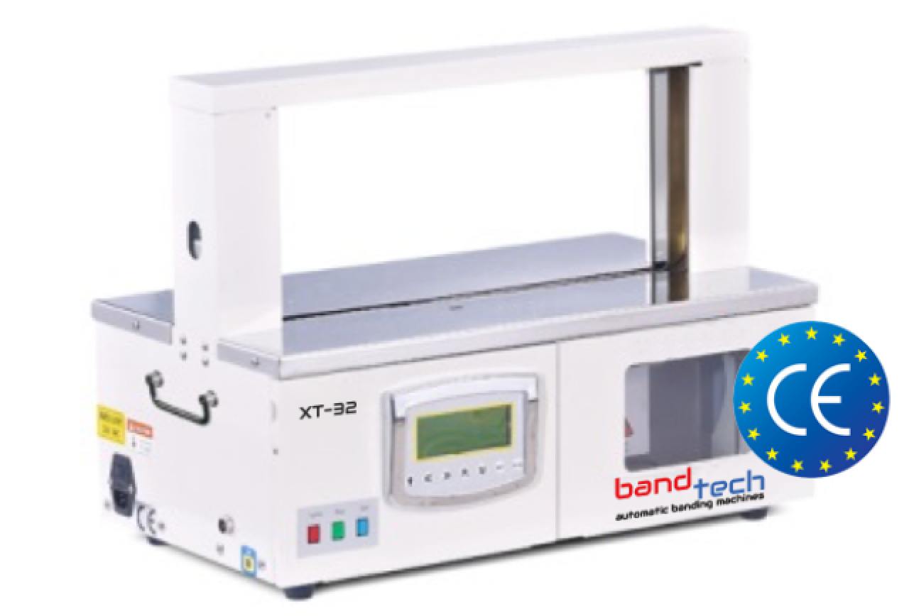 Banderolownica BandTech XT–32 do banderolowania etykiet taśmą papierową poweklekaną lub taśmą polipropylenową (PP).